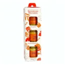 Coffret de trois pots de moutardes aromatiques, saveurs coco curry, piment d'Espelette et citron, dans un emballage floral.